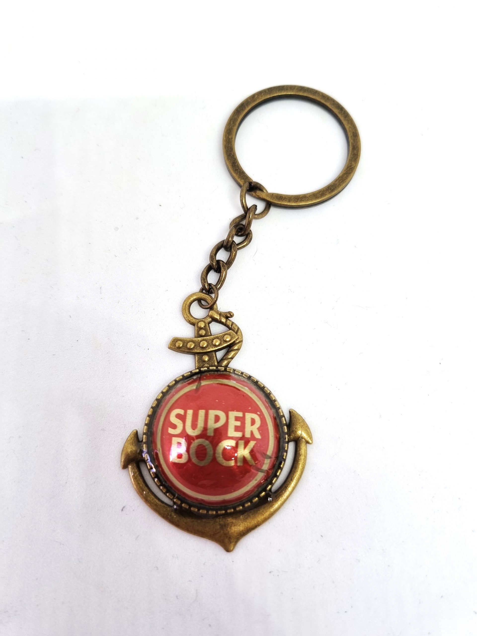 Foto del llavero ancla super bock dorada